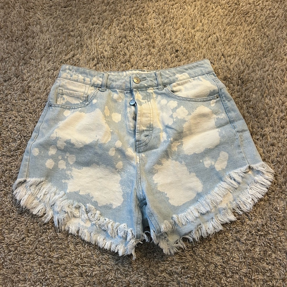 denim/white jean shorts with fringe